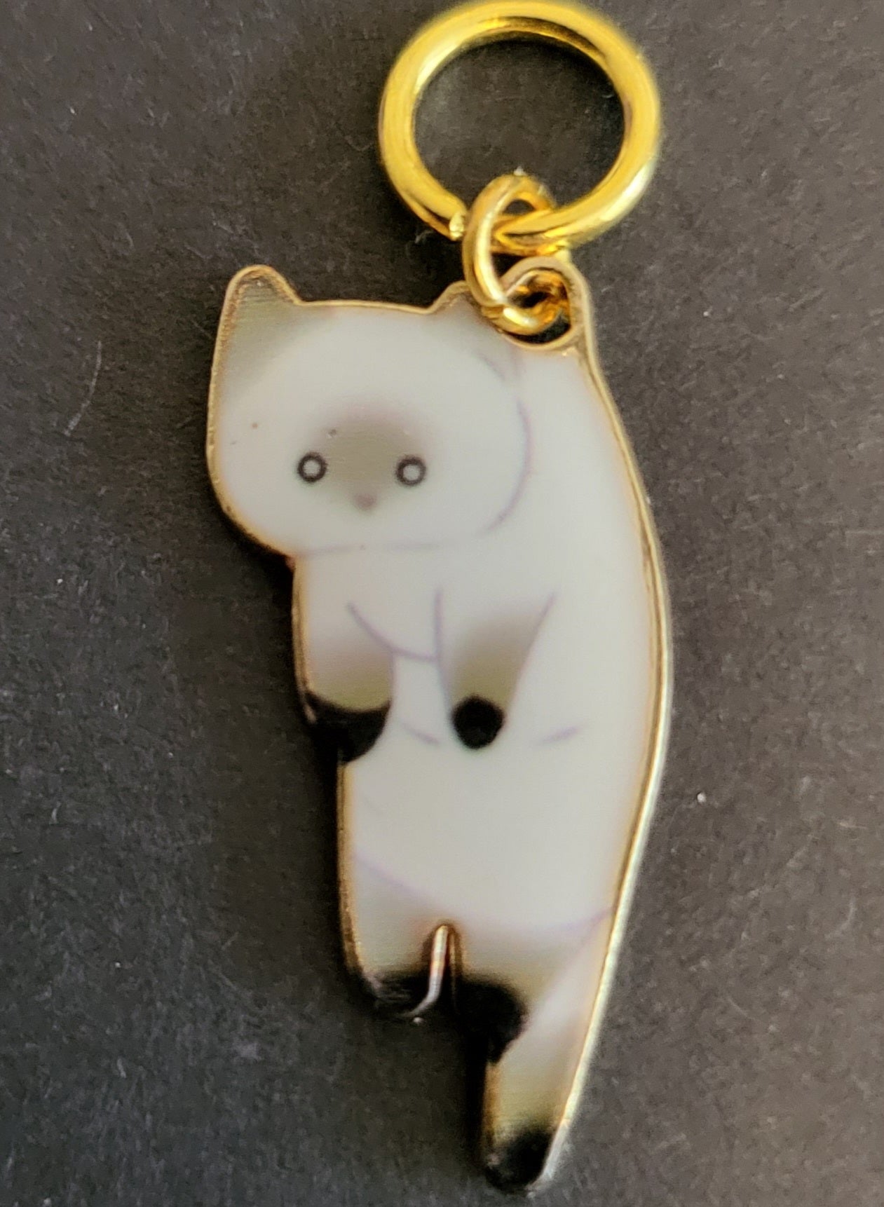 Stitch markers: 6 stages of acceptance - kitten edition